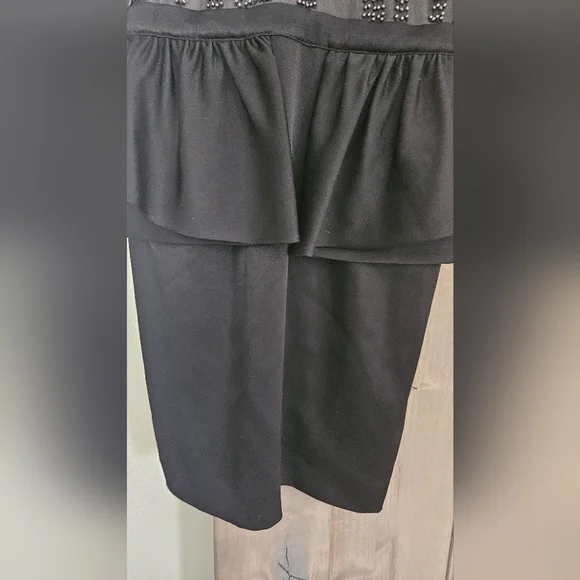 BEBE 90s Beaded top peplum mini dress. Size small - Picture 5 of 11